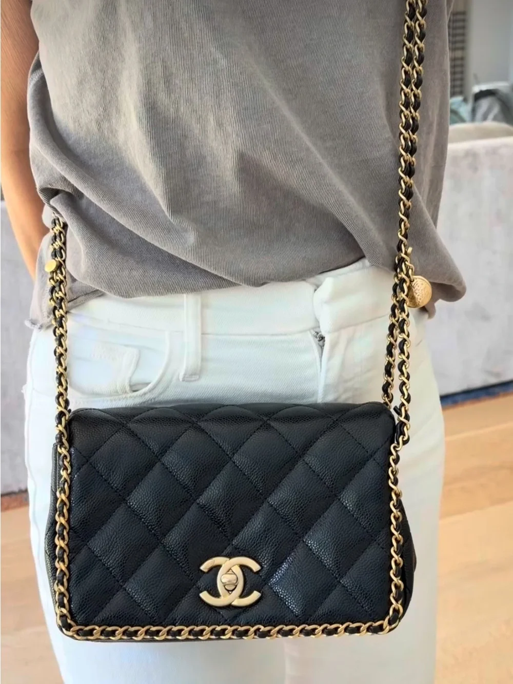 CHANEL Black Quilted Leather Shoulder Bag with Gold Chain Trim